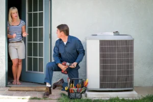 Blog 2 AC, Air Conditioner technician with customer